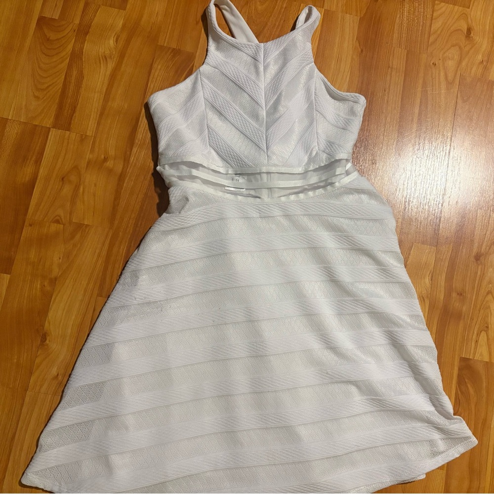Girl’s White Sleeveless Dress